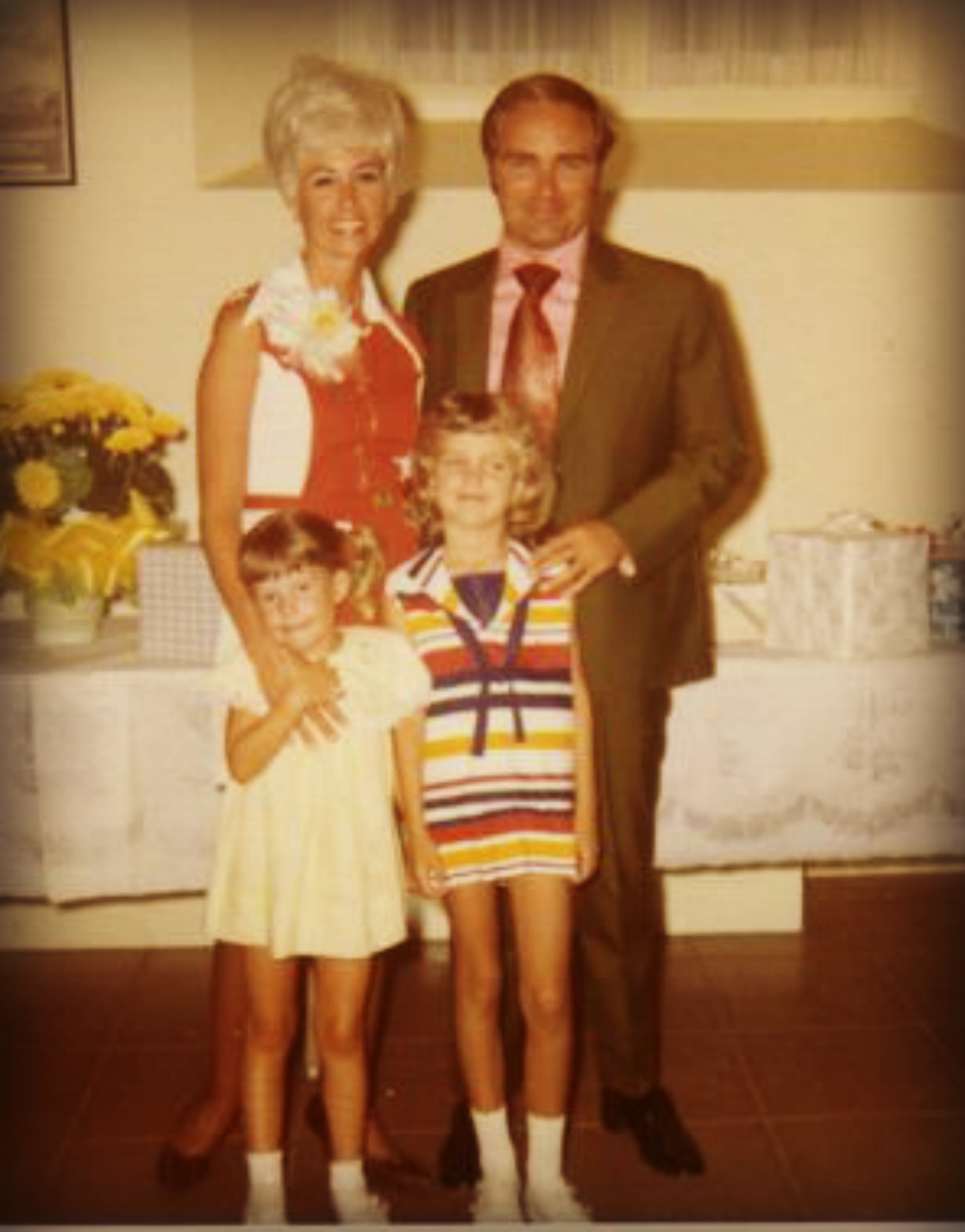 My dad, stepmom, my sister Gina and I at our parent's wedding. I owe my dear stepmom many kisses for keeping me on the straight and narrow growing up.