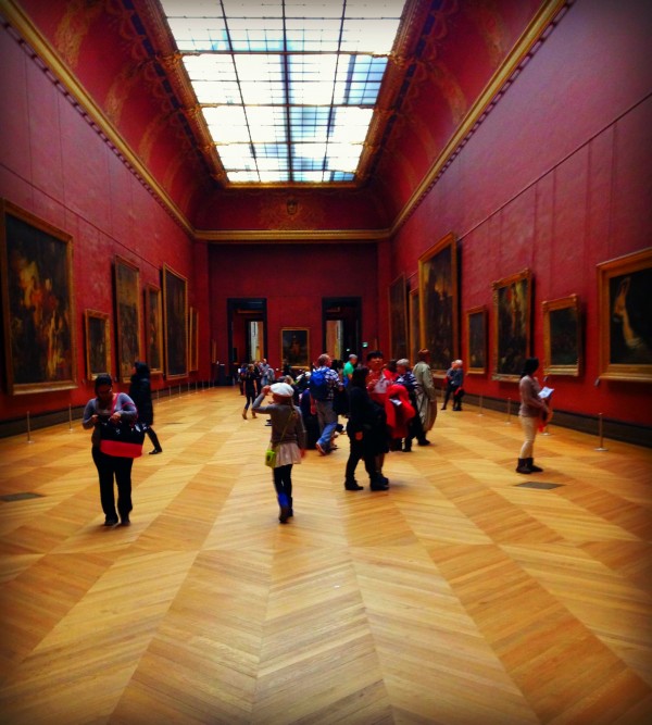 Bridget walking the Grand Gallerie at the Louvre.